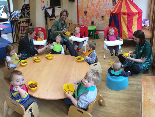 Feeding the babies at Acorns Nursery School, Cirencester.